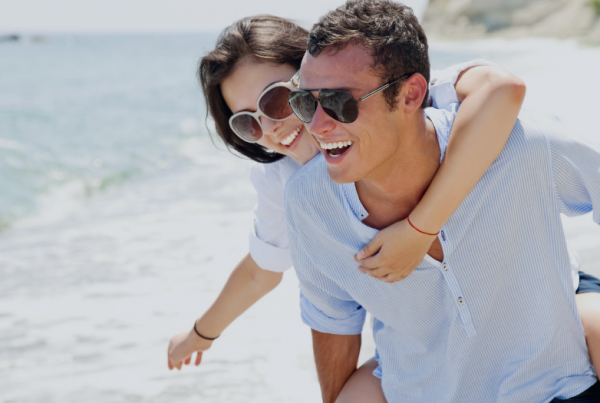 happy couple on the beach