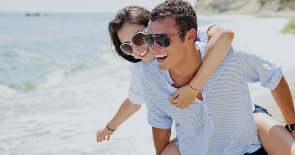 happy couple on the beach